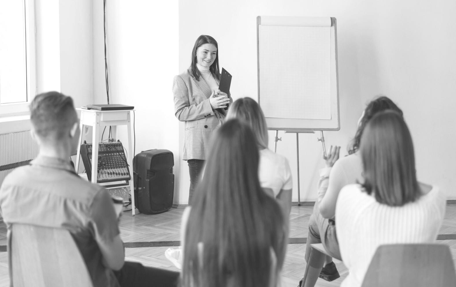 Financial planning documents and calculator showing real expense tracking