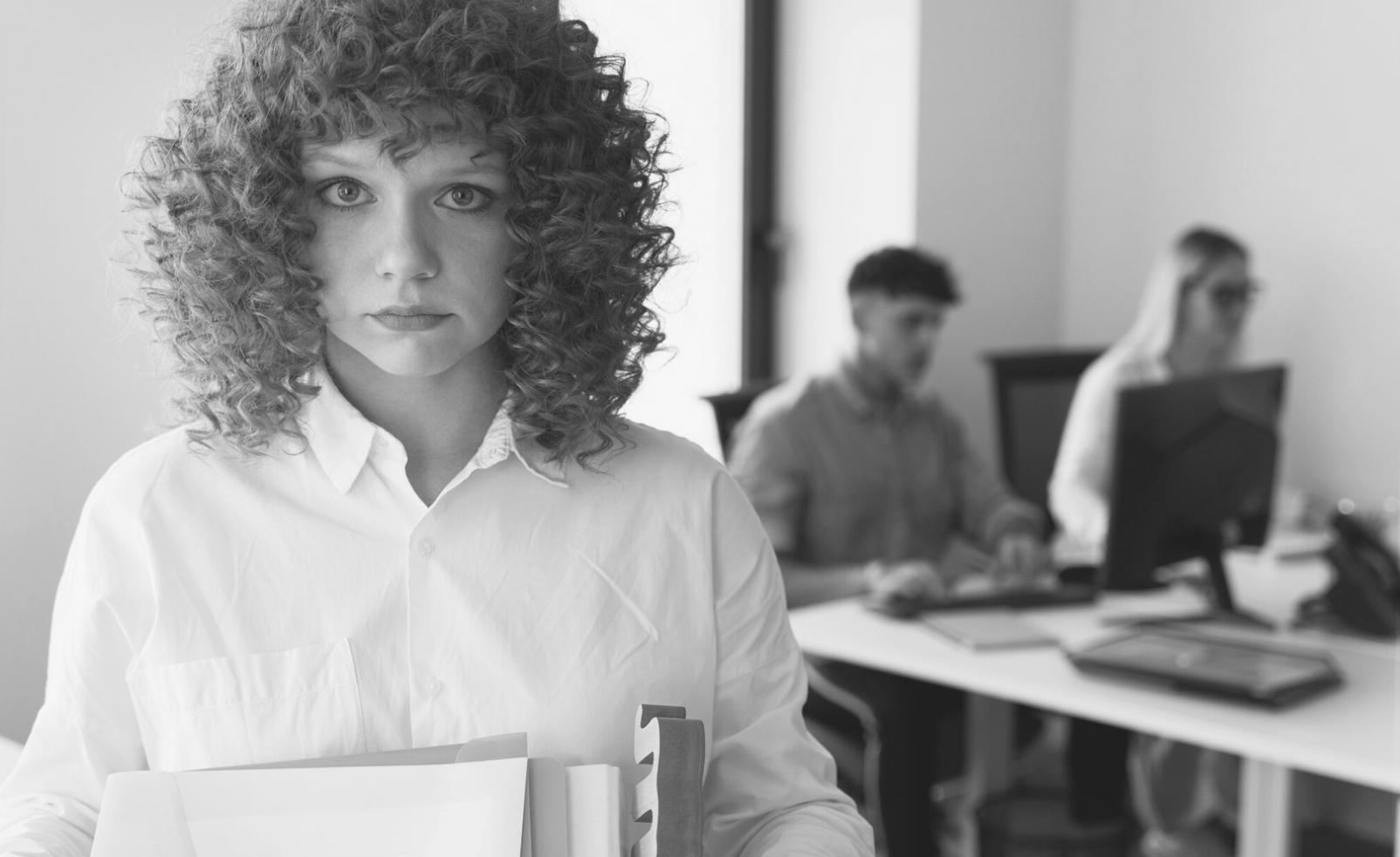 Person reviewing financial planning materials during budget strategy session